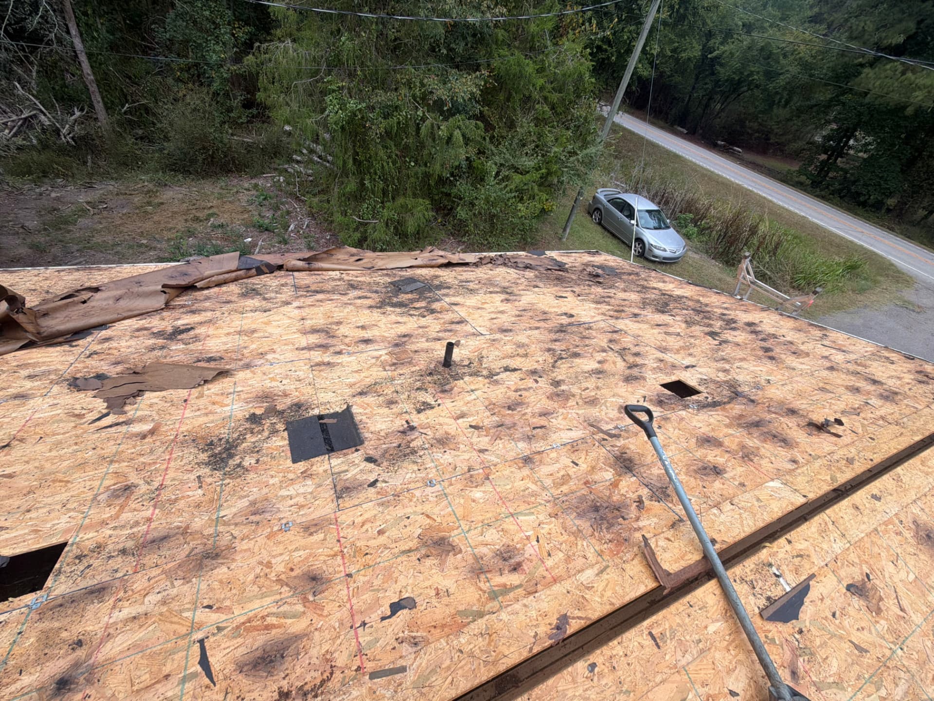 Roof decking inspected during tear-off on a Lake Greenwood home by Coster Roofing Co